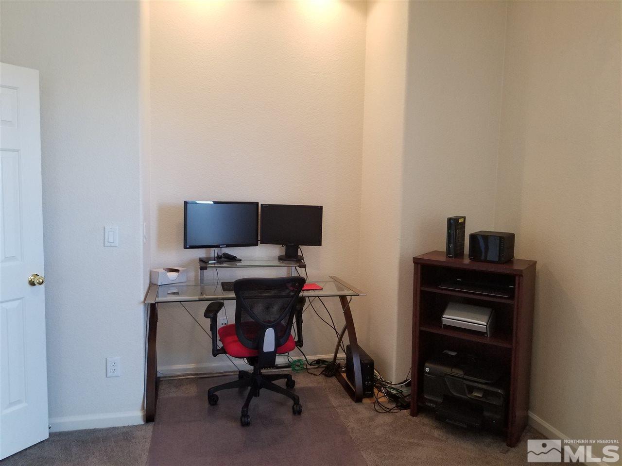 9625 Glen Ridge Drive Reno, NV 89521 - Photo 20 of 23 a view of a workspace with furniture