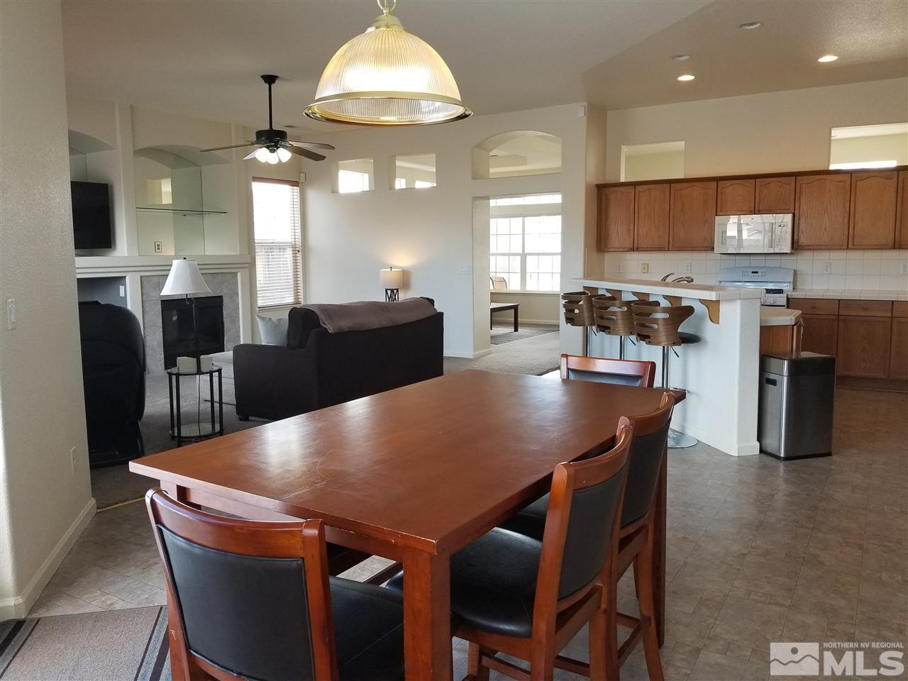 9625 Glen Ridge Drive Reno, NV 89521 - Photo 6 of 23 a view of a dining room with furniture
