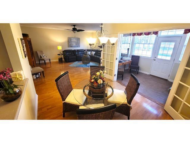 427 Colonial Trace Drive, Unit 1E Longs, SC 29568 - Photo 12 of 35 Dining space with hardwood / wood-style floors and