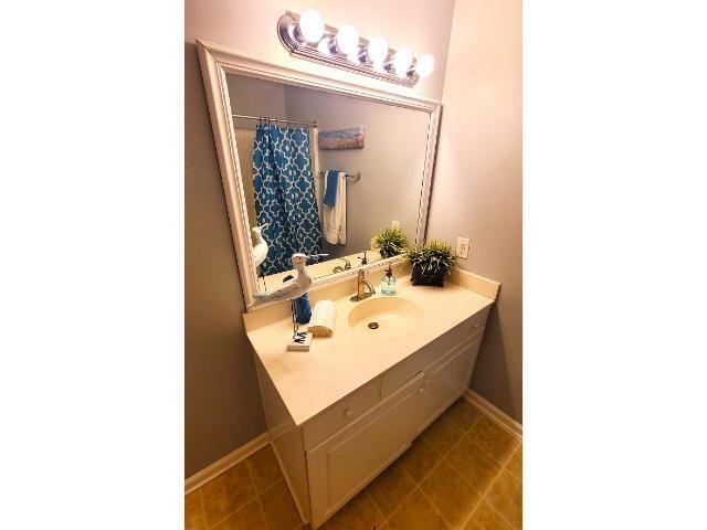 427 Colonial Trace Drive, Unit 1E Longs, SC 29568 - Photo 26 of 35 Bathroom featuring vanity