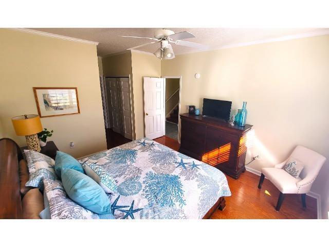 427 Colonial Trace Drive, Unit 1E Longs, SC 29568 - Photo 5 of 35 Bedroom with hardwood / wood-style flooring, ceili