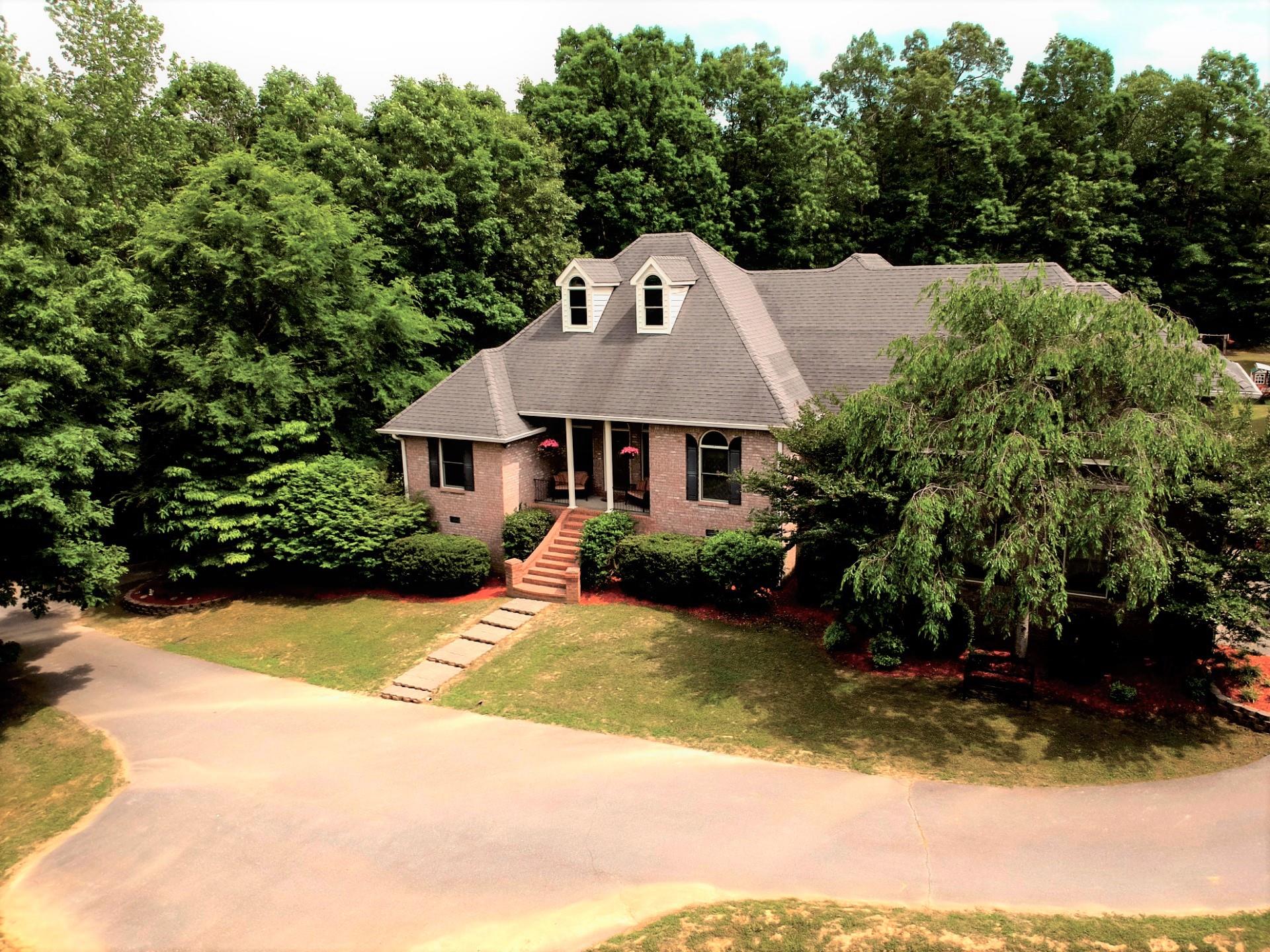 This contemporary home is privately situated on 15 acres. The home is not visible from the street. 