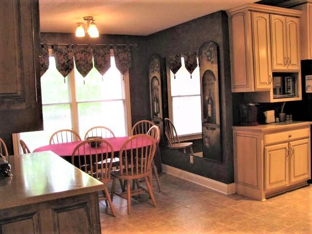 210 Airport Road Waverly, TN 37185 - Photo 13 of 30 The kitchen also has a lovely dining area.