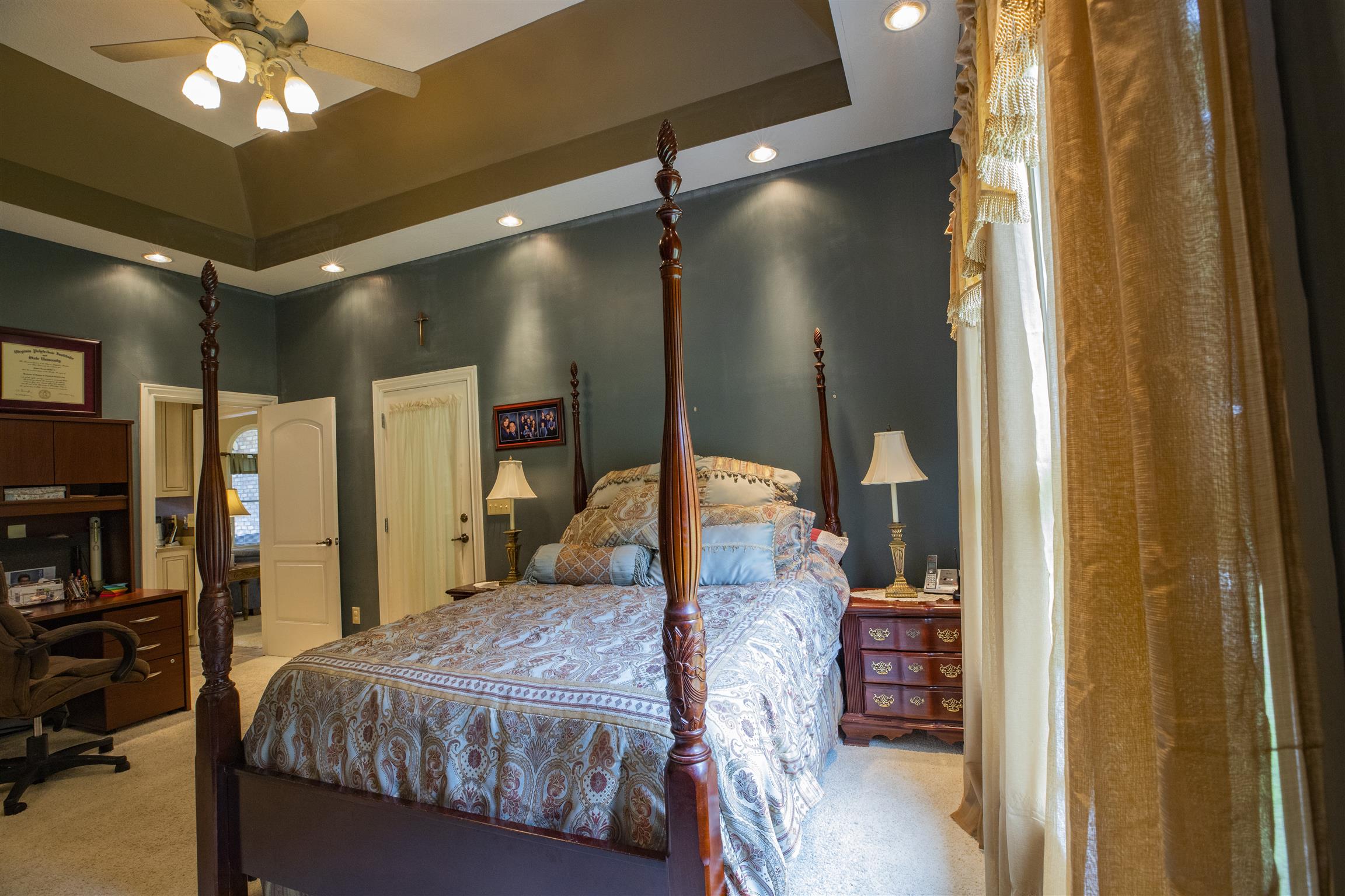 210 Airport Road Waverly, TN 37185 - Photo 17 of 30 The master bedroom suite consists of this lovely bedroom, a full bath with separate tub and shower and walk-in closet.