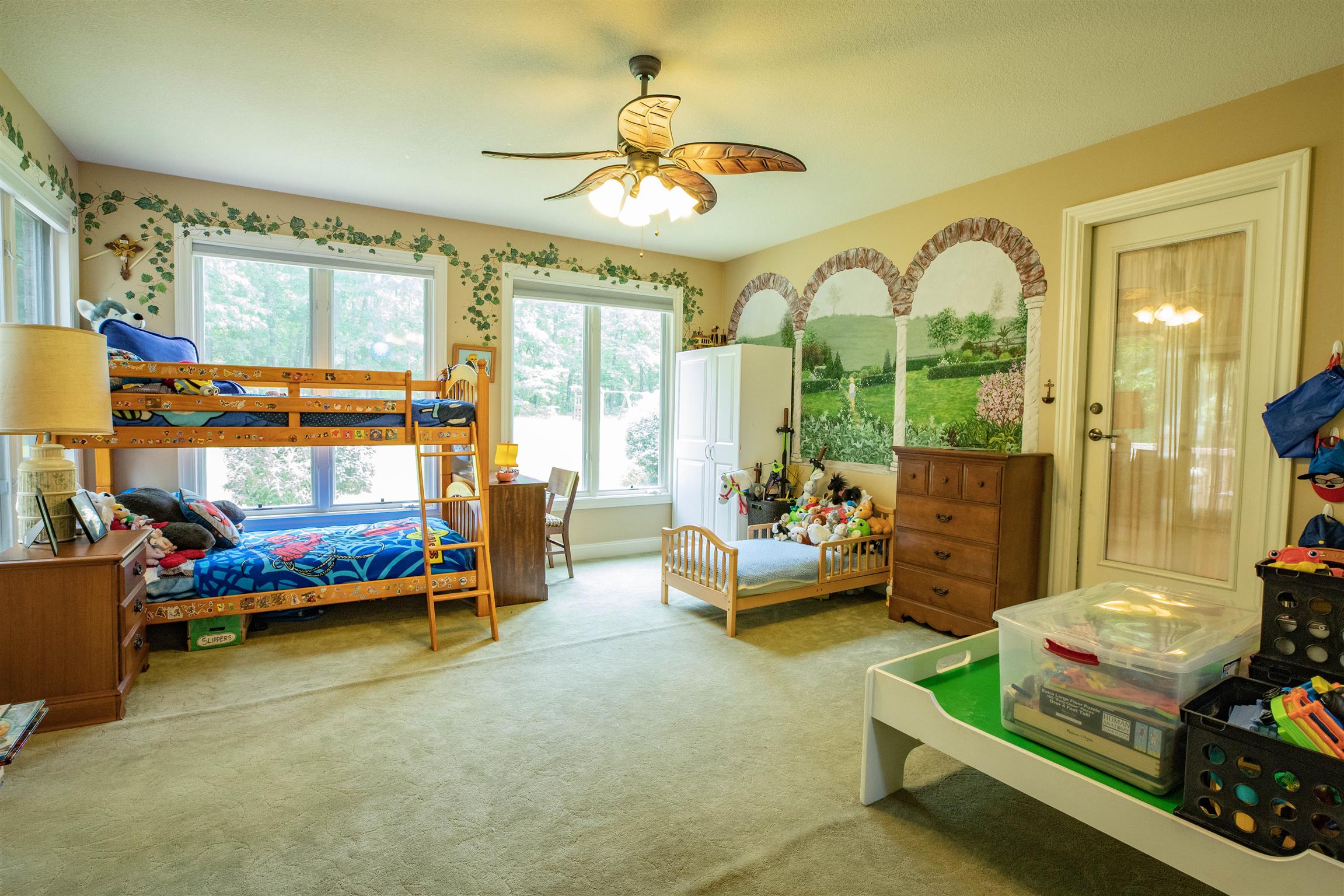 210 Airport Road Waverly, TN 37185 - Photo 23 of 30 The sunroom connects to the master bedroom and opens to the deck.