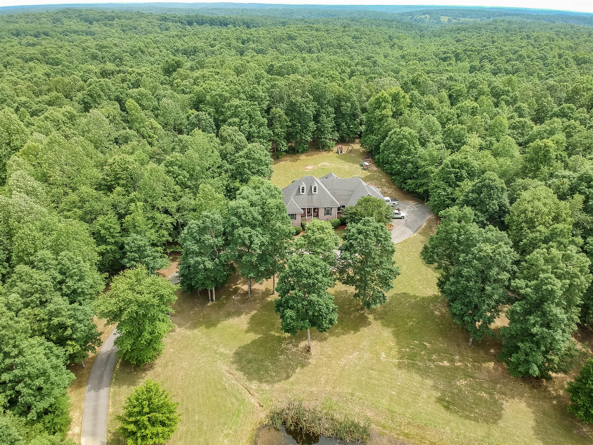 210 Airport Road Waverly, TN 37185 - Photo 30 of 30 You will love the convenience of this property's location, minutes from downtown yet surrounded by this gorgeous forest. Future development cannot encroach on your privacy with this property!