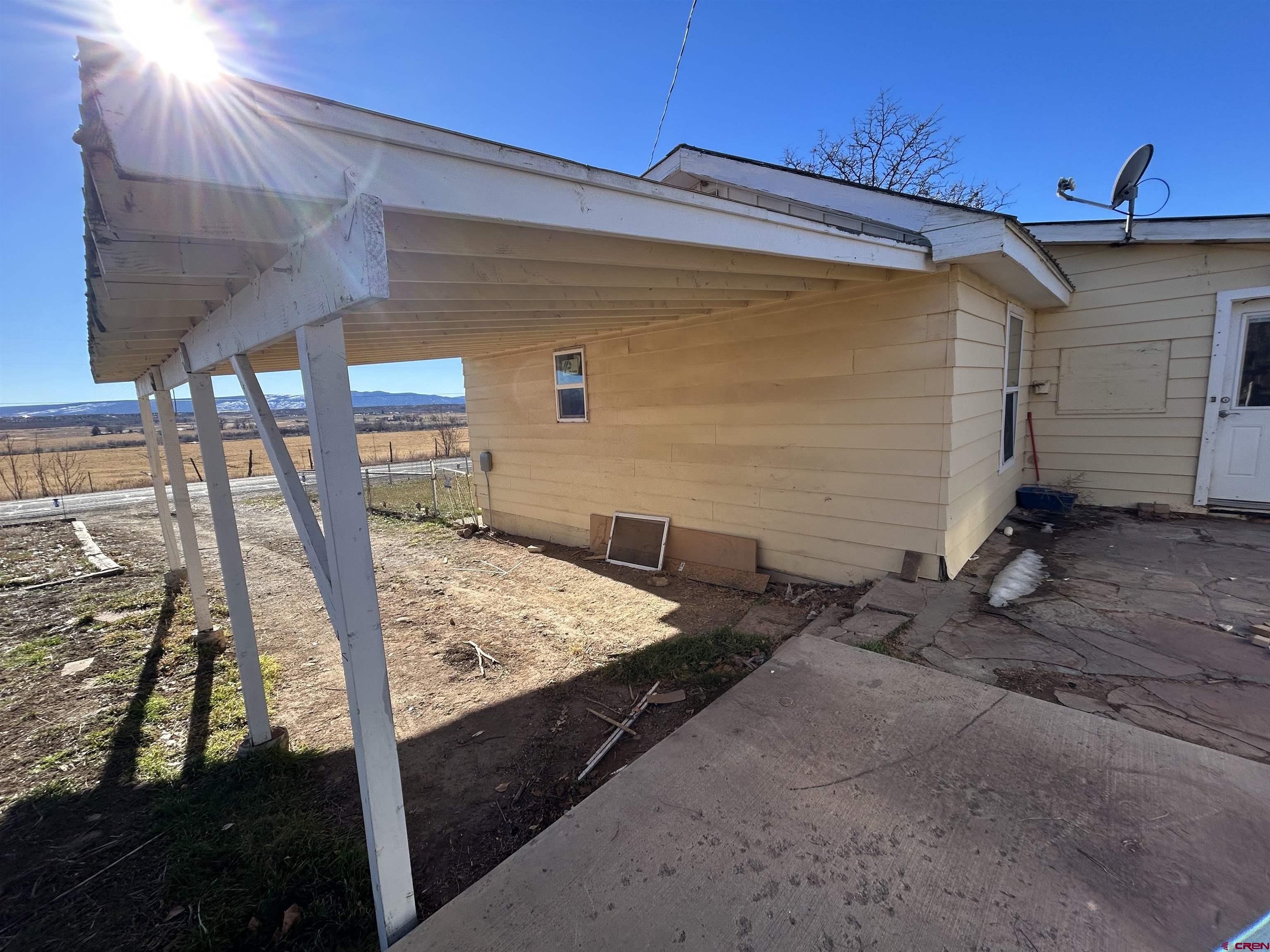 27643 BB Road Nucla, CO 81424 - Photo 14 of 21 a view of a back yard of the house