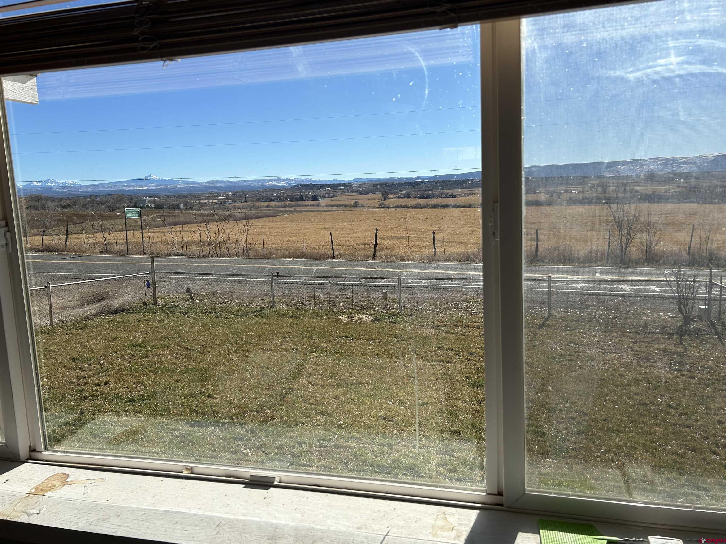 27643 BB Road Nucla, CO 81424 - Photo 20 of 21 a view of a glass door with a lake view