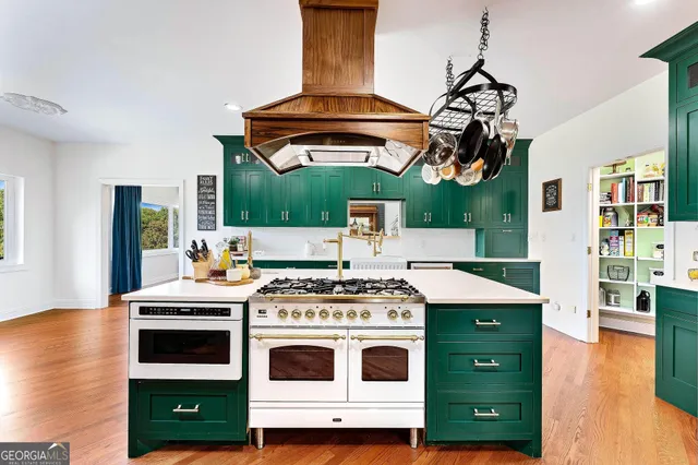 a bedroom with a bed dresser and a window