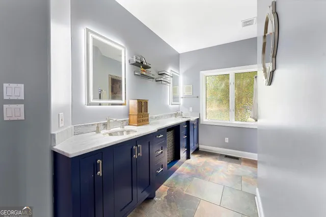 a view of living room with furniture and a window