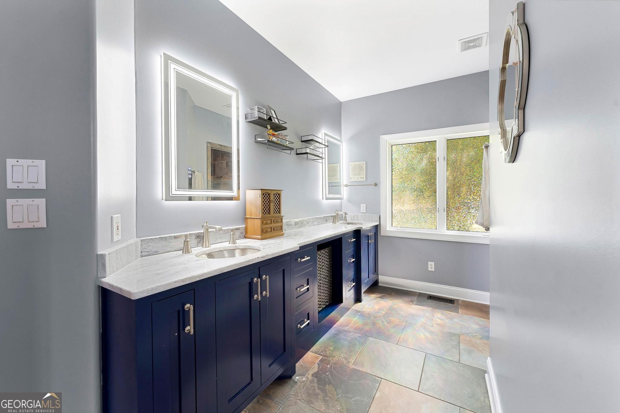 366 Curt Bailey Road Hartwell, GA 30643 - Photo 28 of 83 a spacious bathroom with a tub sink and mirror