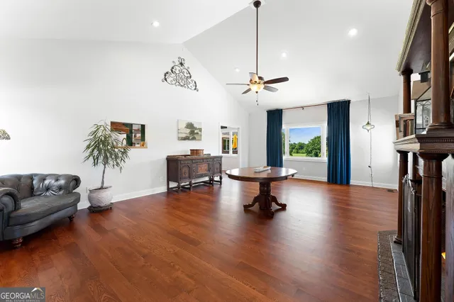 a bedroom with a bed and a dresser in it