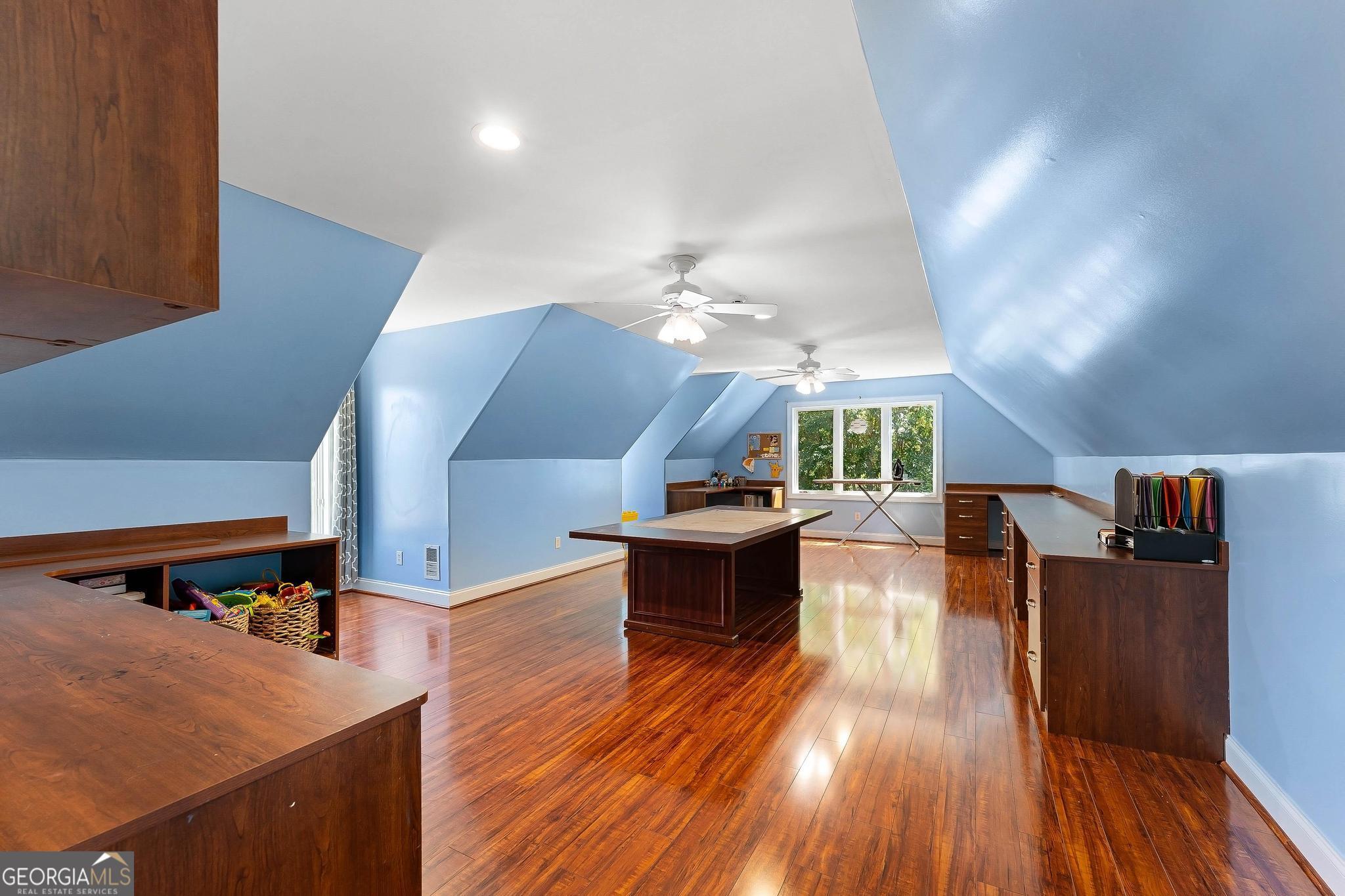 366 Curt Bailey Road Hartwell, GA 30643 - Photo 43 of 83 a living room with furniture and wooden floor