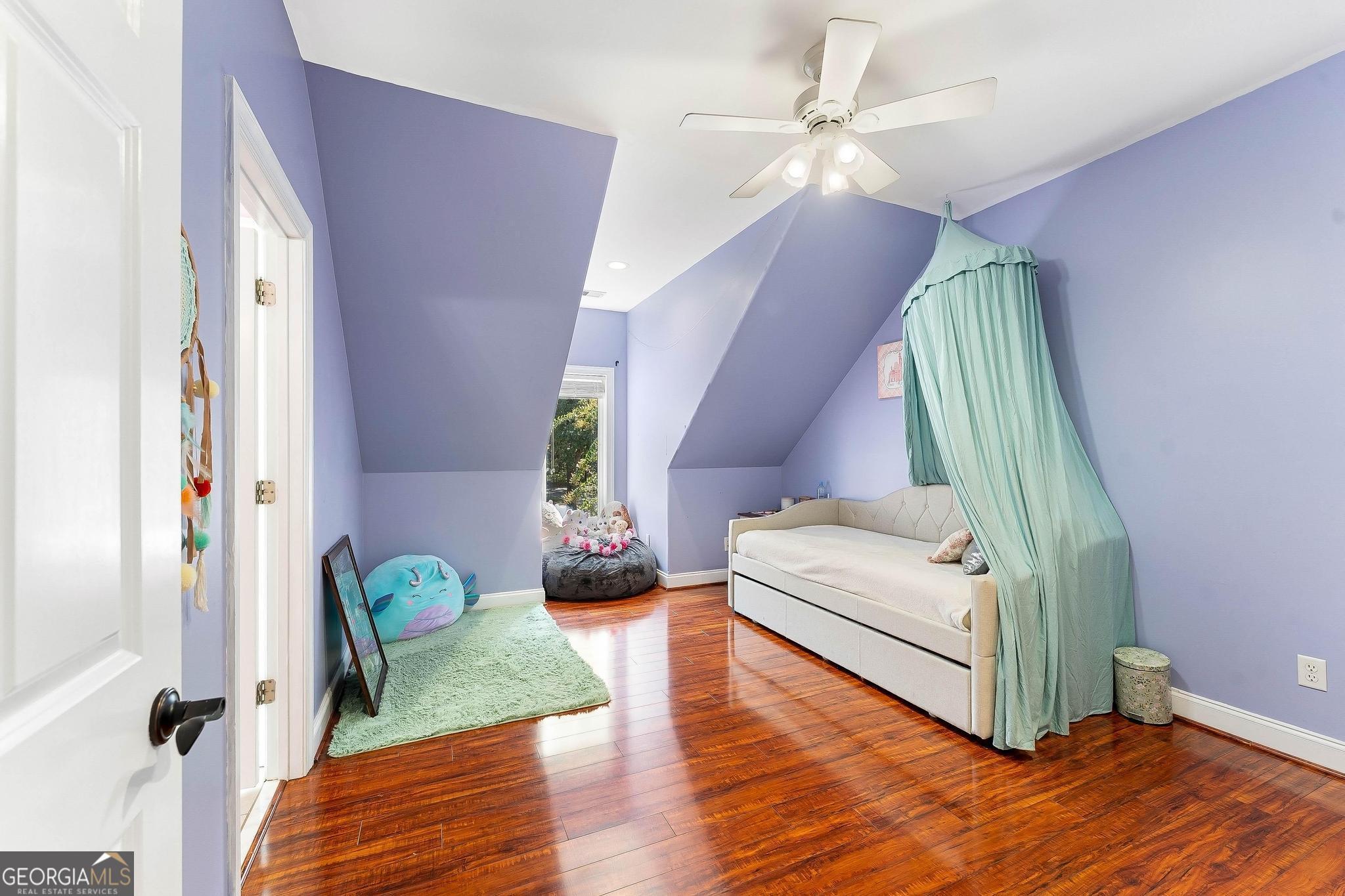 366 Curt Bailey Road Hartwell, GA 30643 - Photo 49 of 83 a living room with furniture and a chandelier