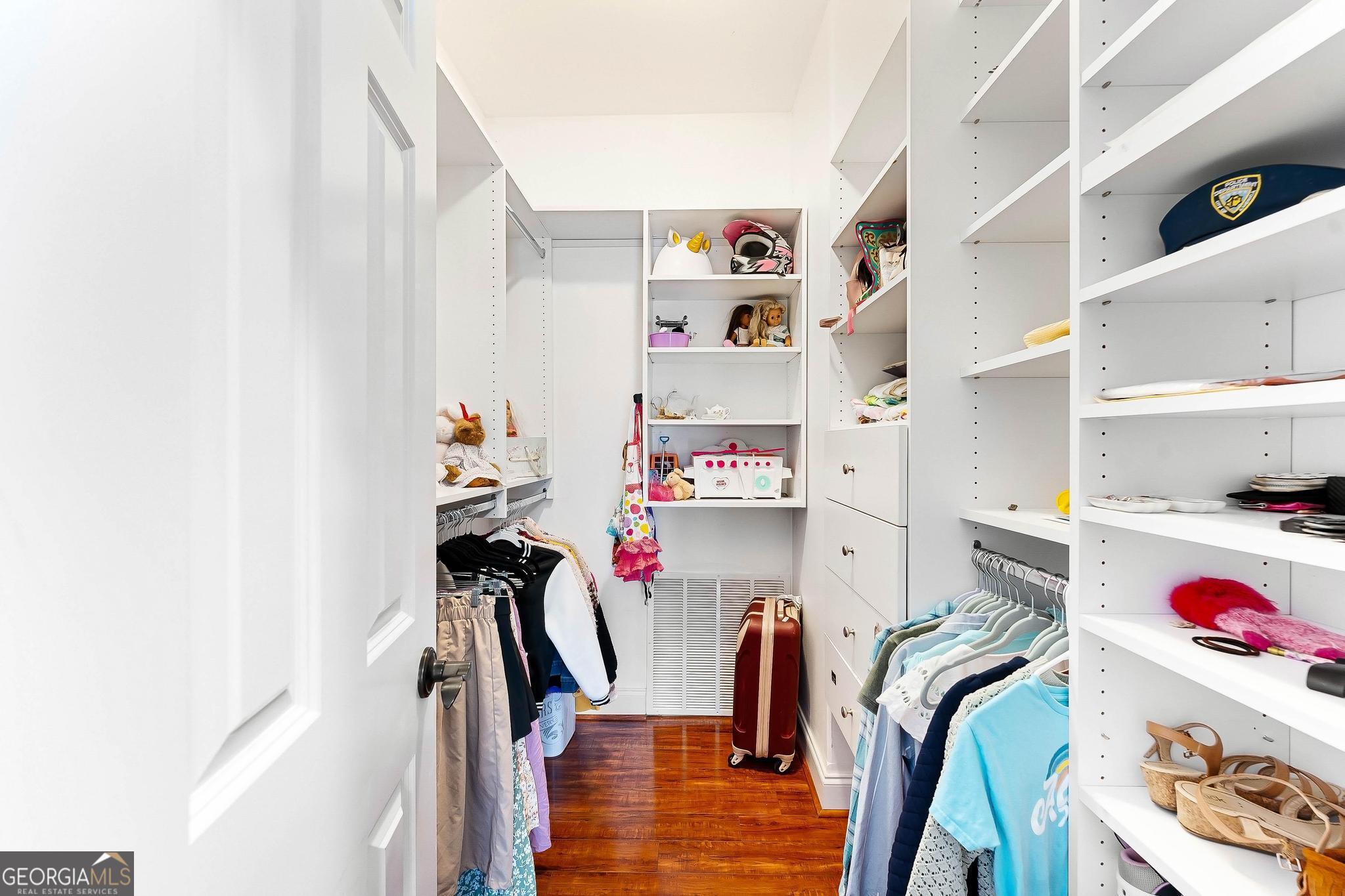366 Curt Bailey Road Hartwell, GA 30643 - Photo 50 of 83 a view of walk in closet with clothes and shoes
