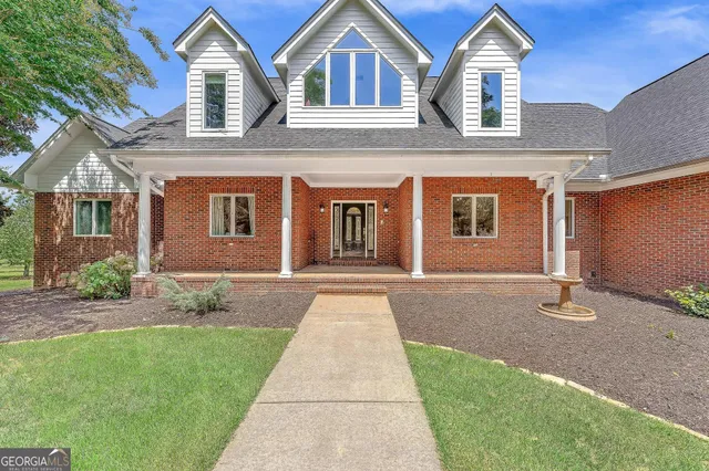 a view of livingroom with dining room and wooden floor