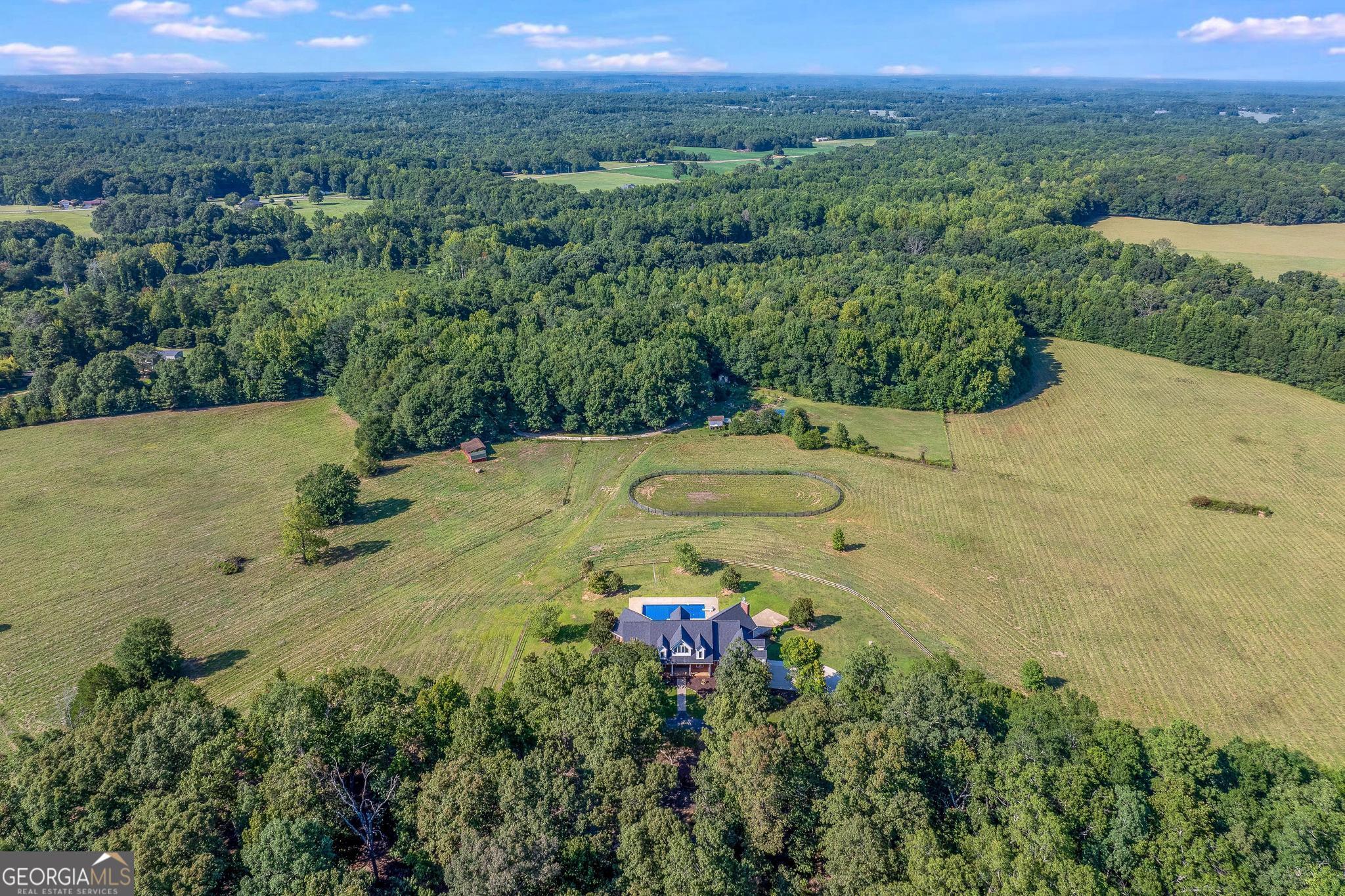 366 Curt Bailey Road Hartwell, GA 30643 - Photo 75 of 83 an aerial view of a houses with a yard and mountain