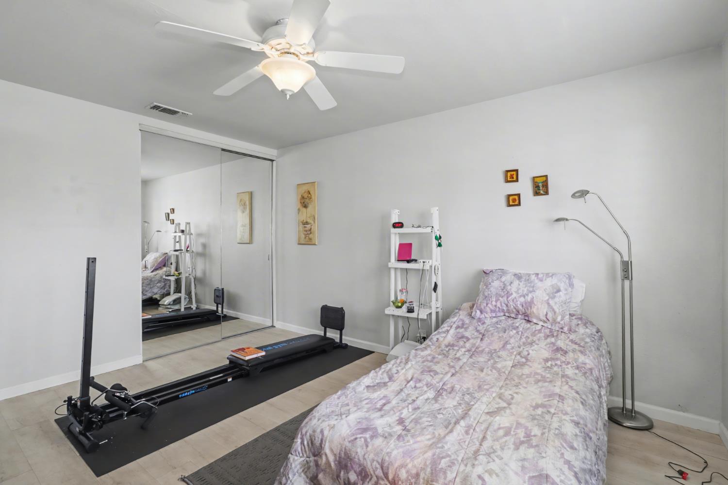 10500 Spaulding Way Rancho Cordova, CA 95670 - Photo 16 of 39 a bed room with a bed and a flat screen tv