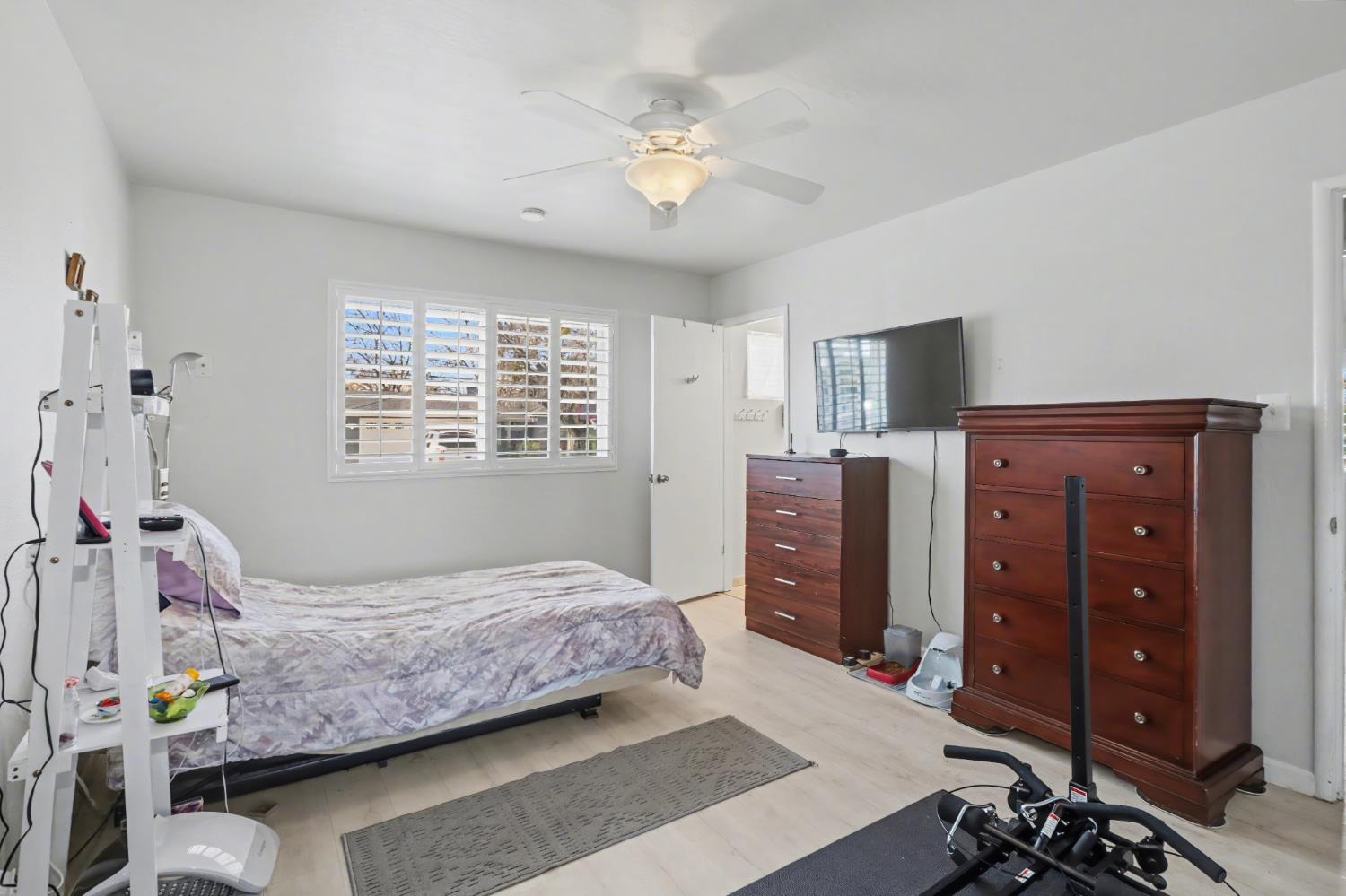 10500 Spaulding Way Rancho Cordova, CA 95670 - Photo 17 of 39 a bedroom with a bed and furniture