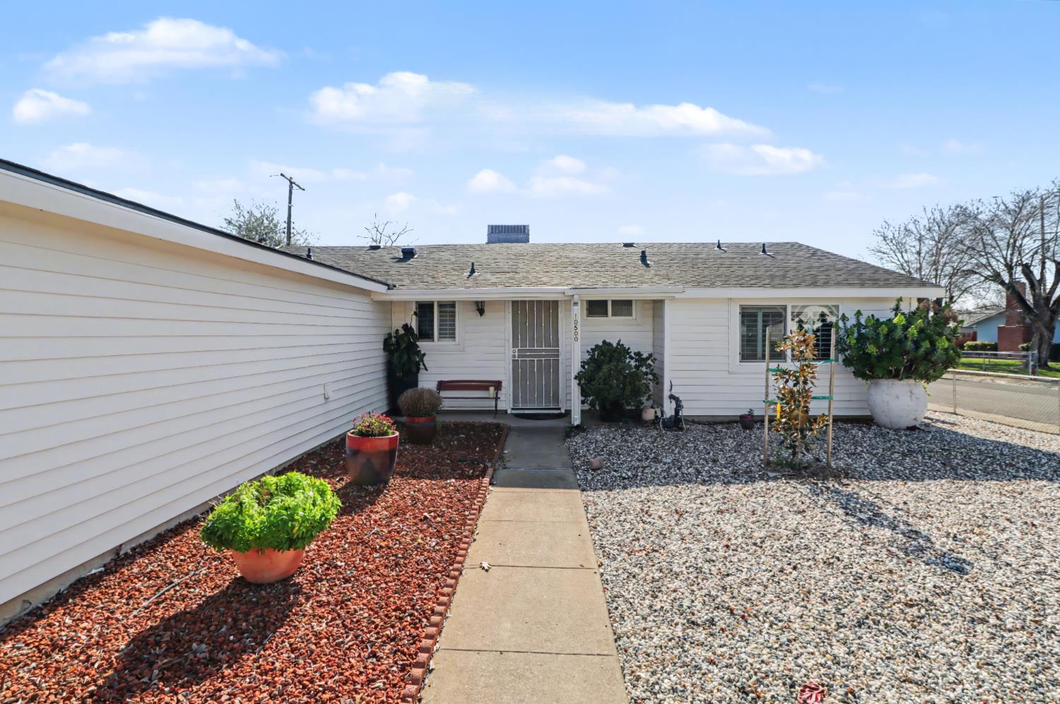 10500 Spaulding Way Rancho Cordova, CA 95670 - Photo 2 of 39 a view of a patio with chair and tables back yard of the house