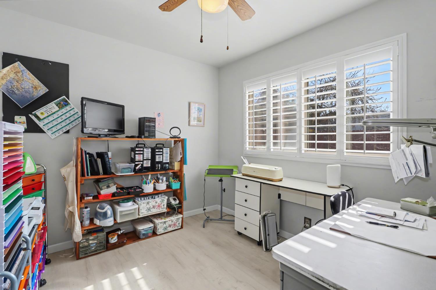 10500 Spaulding Way Rancho Cordova, CA 95670 - Photo 23 of 39 a view of a workspace with furniture and a window