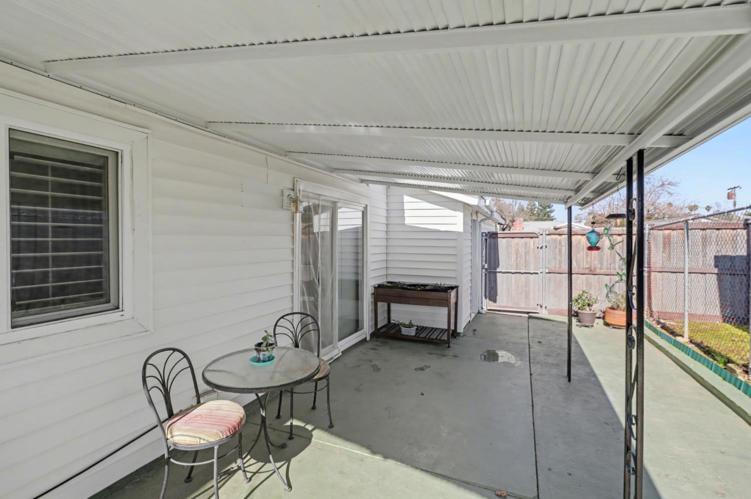 10500 Spaulding Way Rancho Cordova, CA 95670 - Photo 35 of 39 a view of a dining room with furniture window and outside view