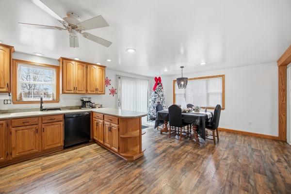 890 Grandview Road Ellwood City, PA 16117 - Photo 11 of 33 a kitchen with stainless steel appliances granite countertop dining table chairs sink and window