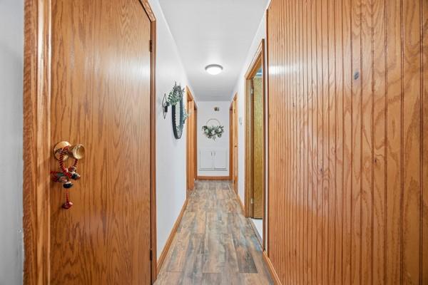 890 Grandview Road Ellwood City, PA 16117 - Photo 15 of 33 a view of a hallway with wooden floor