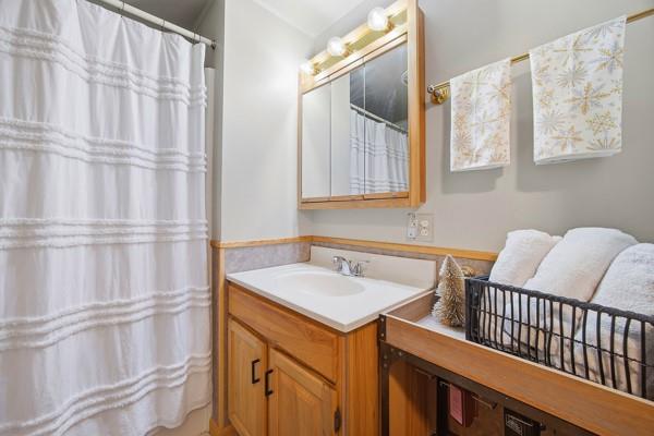 890 Grandview Road Ellwood City, PA 16117 - Photo 22 of 33 a bathroom with a sink and a mirror