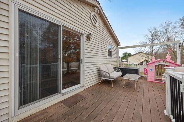 890 Grandview Road Ellwood City, PA 16117 - Photo 29 of 33 a view of a patio with couches and table and chairs with wooden floor