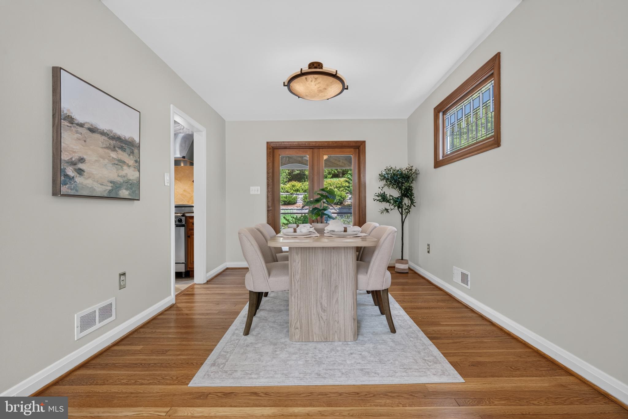3 North Hilltop Road Baltimore, MD 21228 - Photo 7 of 34 Dining rm w French doors into to lg screened porch