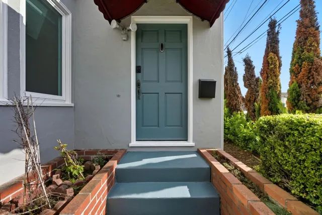 a house view with a garden space