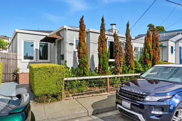 a view of a balcony with chairs