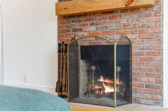 a bathroom with a sink and glass door