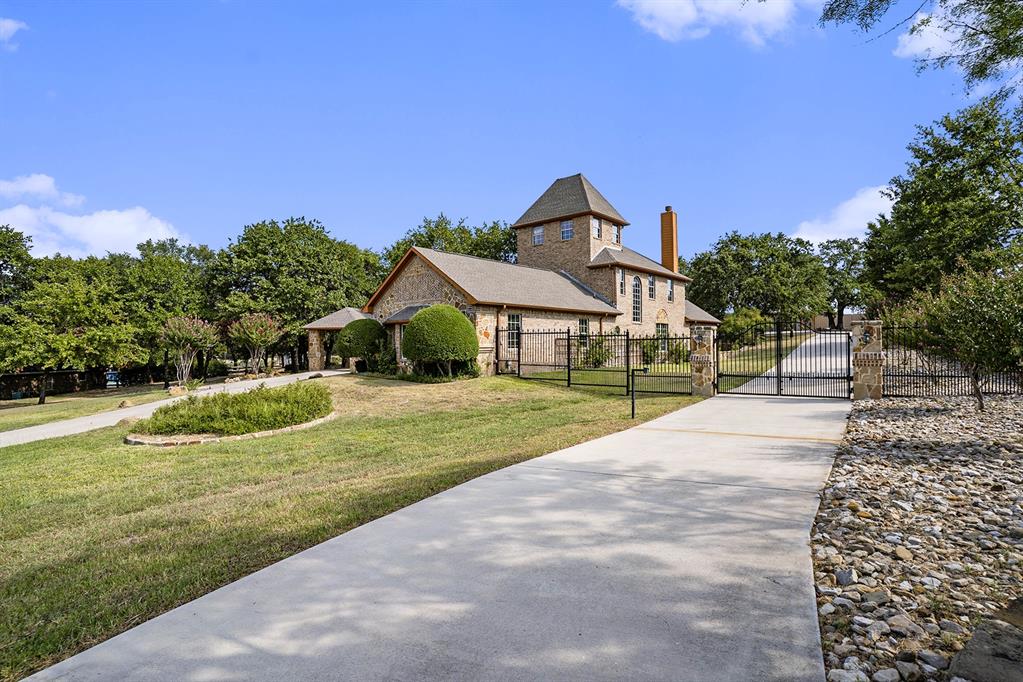 112 Bonita Drive Springtown, TX 76082 - Photo 29 of 39 a view of a house with a yard