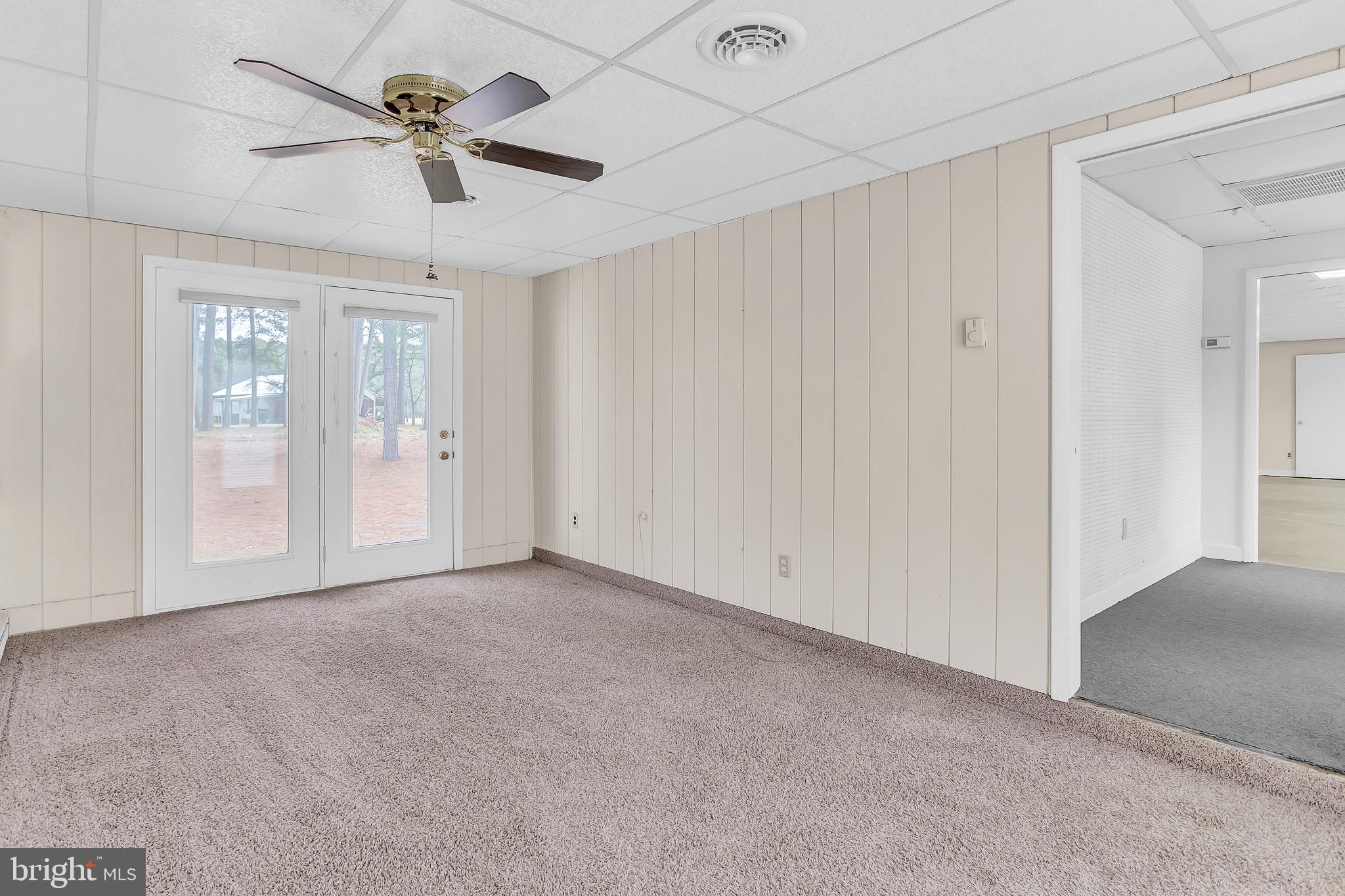 26919 Fitzgerald Road Princess Anne, MD 21853 - Photo 47 of 84 a view of an empty room with a ceiling fan