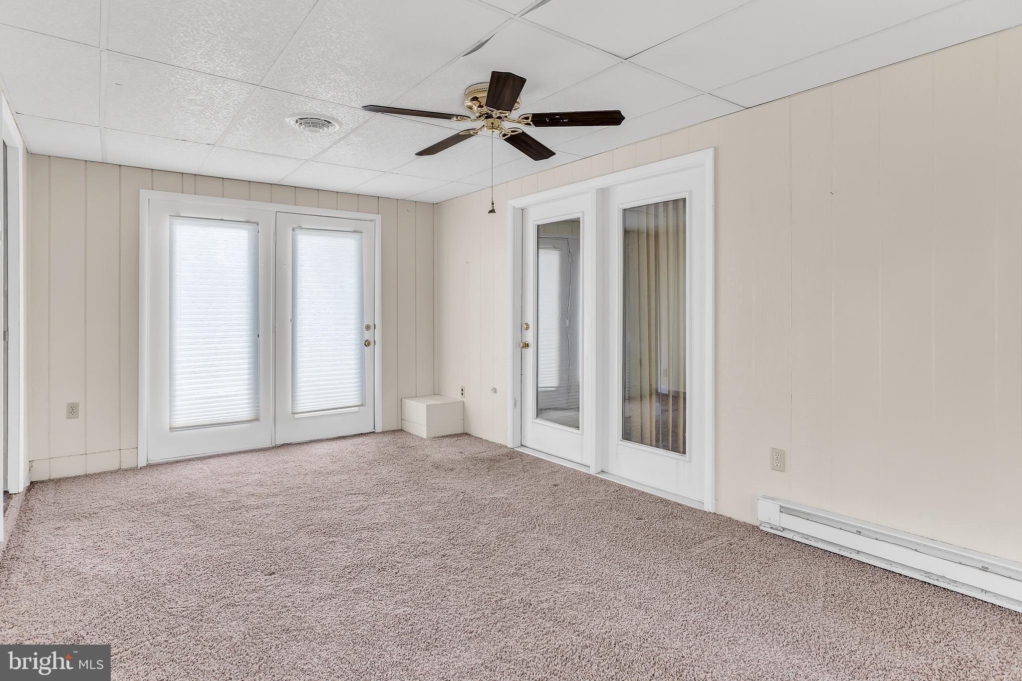 26919 Fitzgerald Road Princess Anne, MD 21853 - Photo 49 of 84 an empty room with ceiling fan