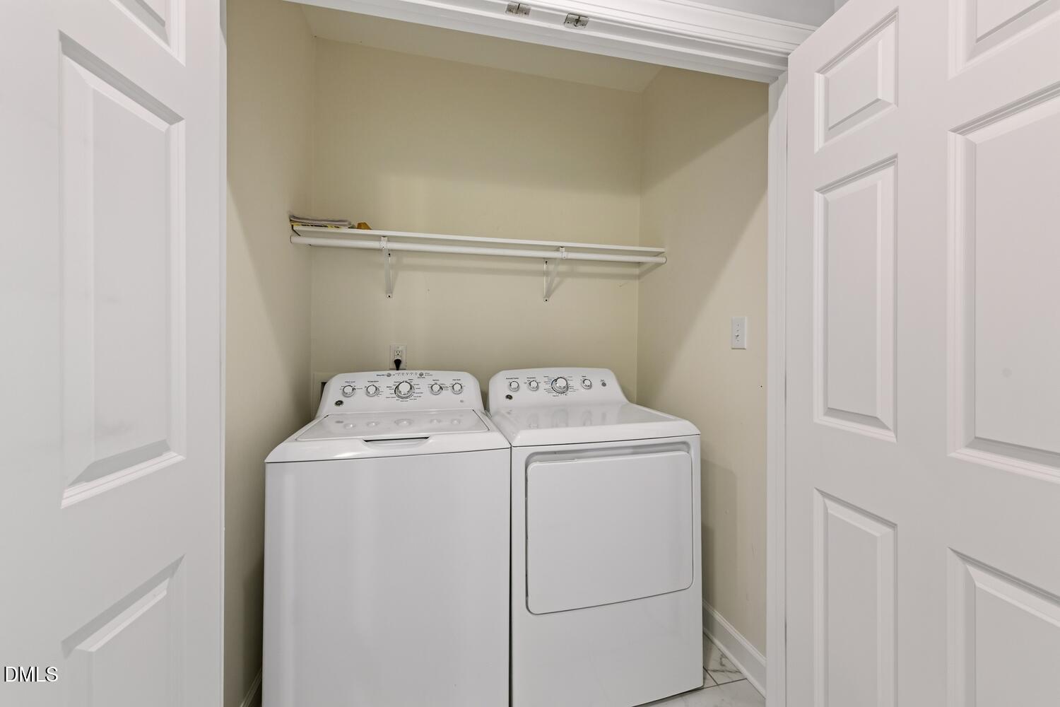 217 Moline Street Durham, NC 27707 - Photo 14 of 30 a utility room with dryer and washer
