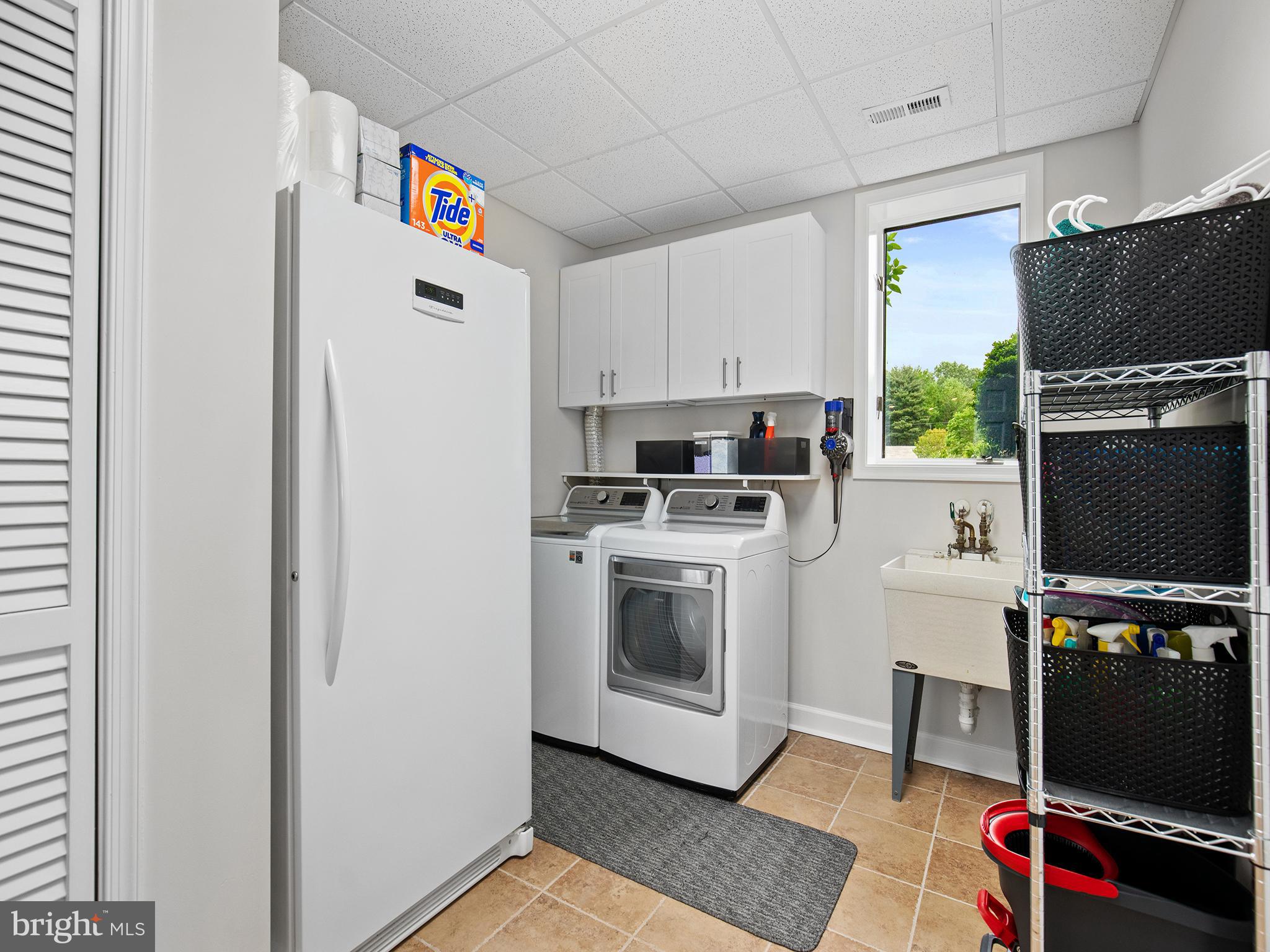 24278 Half Pone Point Road Hollywood, MD 20636 - Photo 54 of 69 Utility room with laundry and sink!
