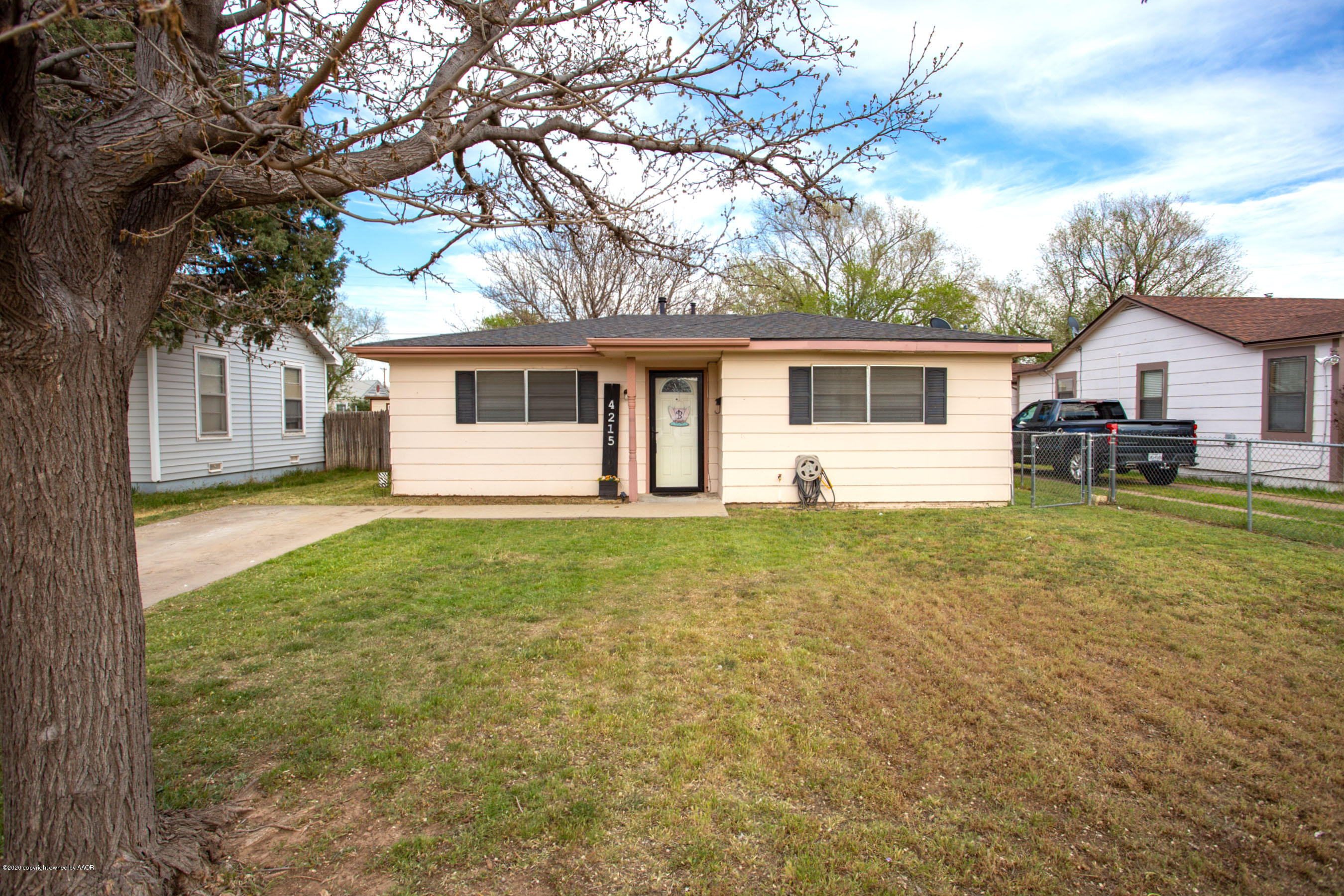 4215 South Monroe Street Amarillo, TX 79110 - Photo 3 of 27 a view of a house with a backyard