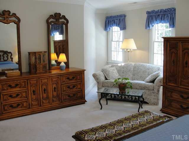 6212 Rein Street Raleigh, NC 27613 - Photo 9 of 12 Sitting area of the master suite.