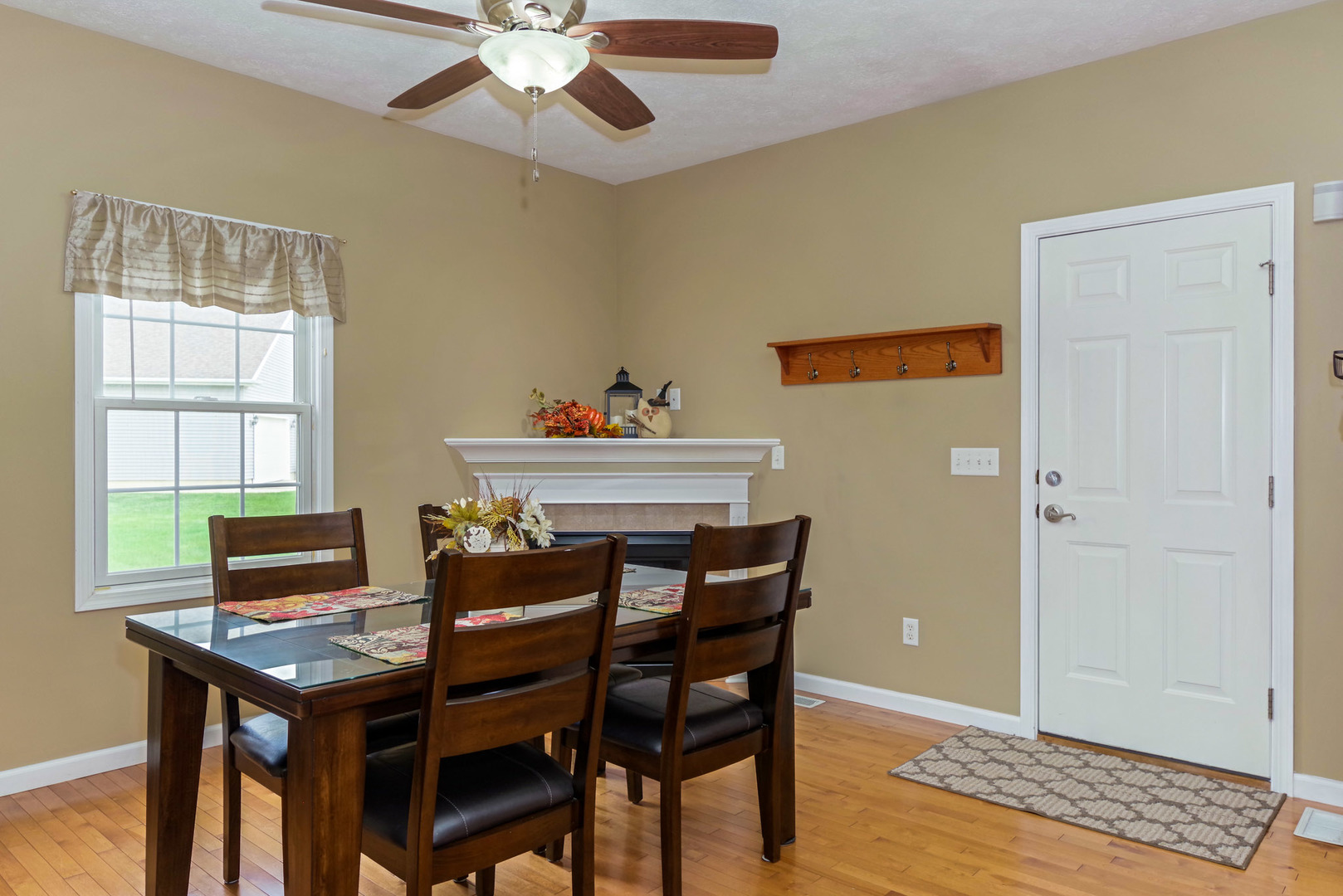 1611 Belclare Road Normal, IL 61761 - Photo 12 of 34 a view of a dining room with furniture and a window