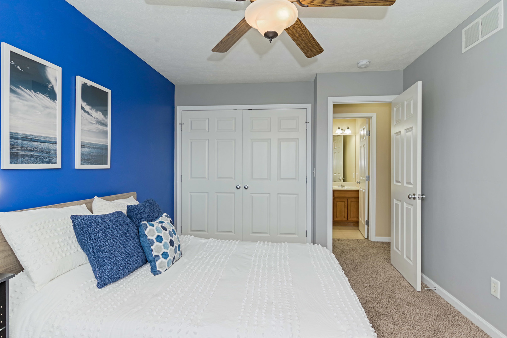 1611 Belclare Road Normal, IL 61761 - Photo 22 of 34 a bed room with a bed and a window
