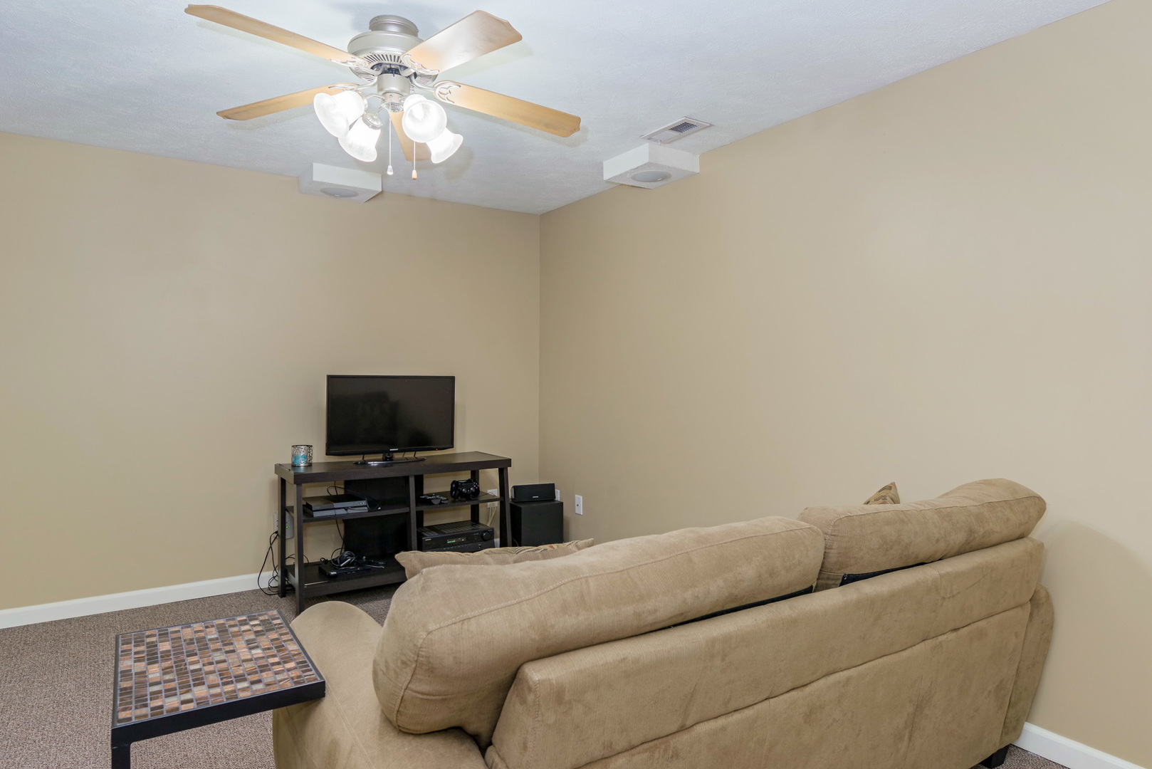 1611 Belclare Road Normal, IL 61761 - Photo 23 of 34 a living room with furniture a flat screen tv and a window