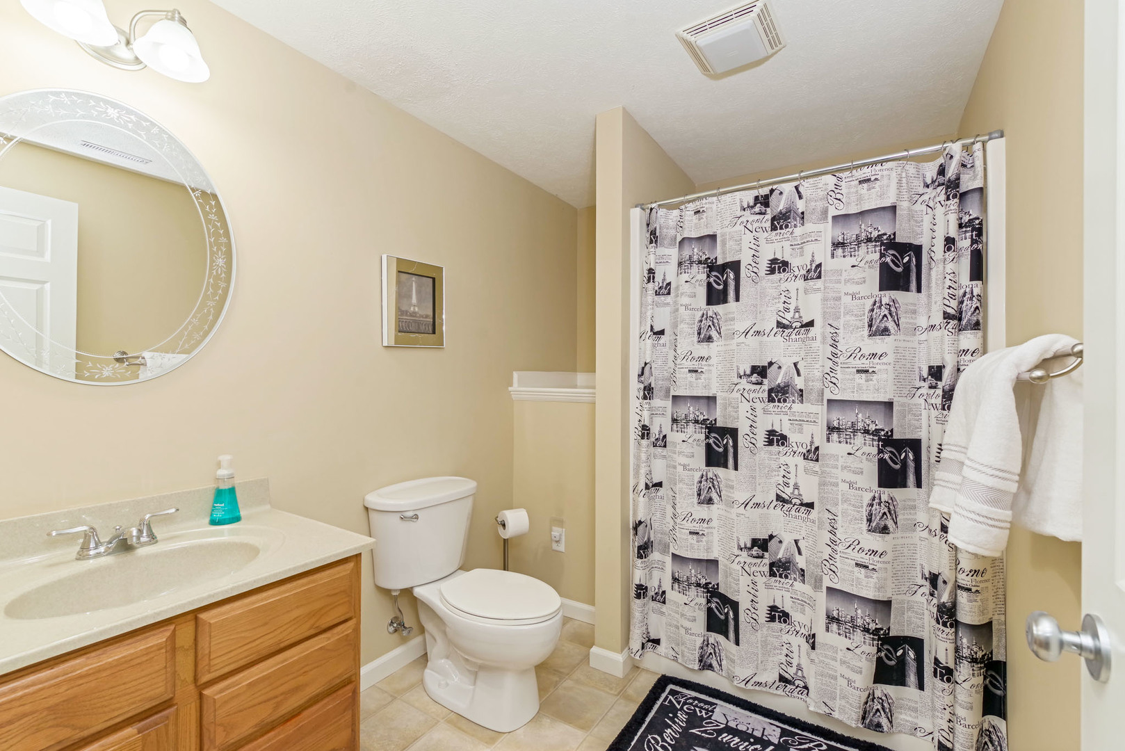1611 Belclare Road Normal, IL 61761 - Photo 27 of 34 a bathroom with a sink toilet and shower