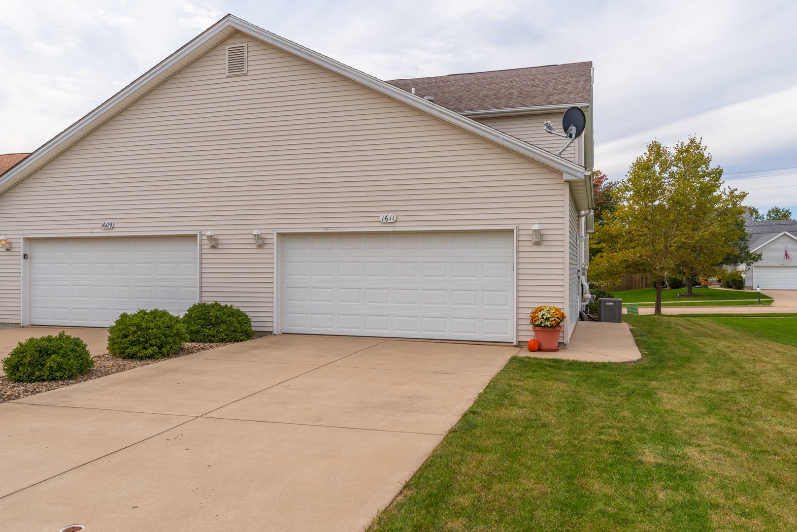 1611 Belclare Road Normal, IL 61761 - Photo 30 of 34 a front view of house with garage and yard