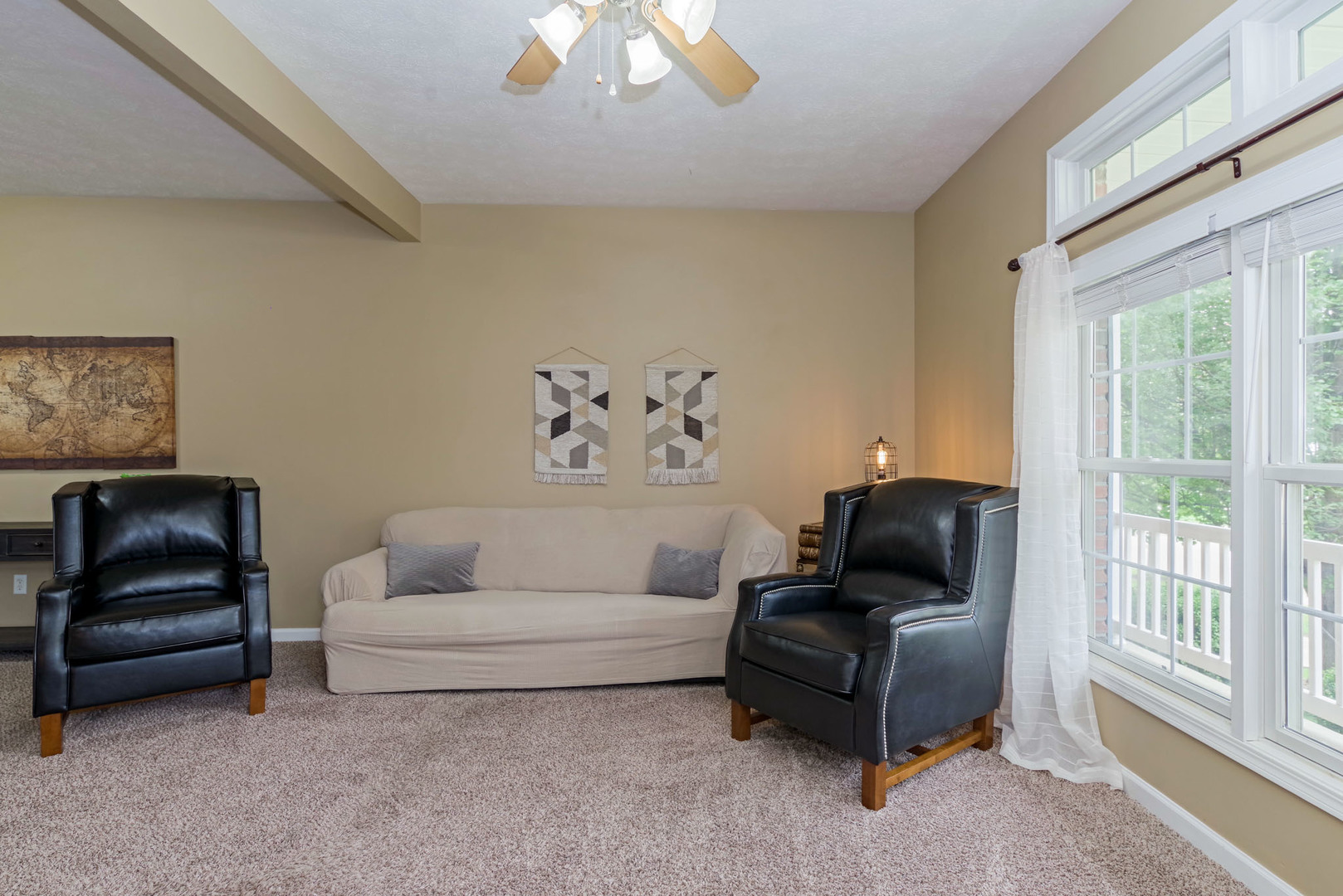1611 Belclare Road Normal, IL 61761 - Photo 6 of 34 a living room with furniture and a large window