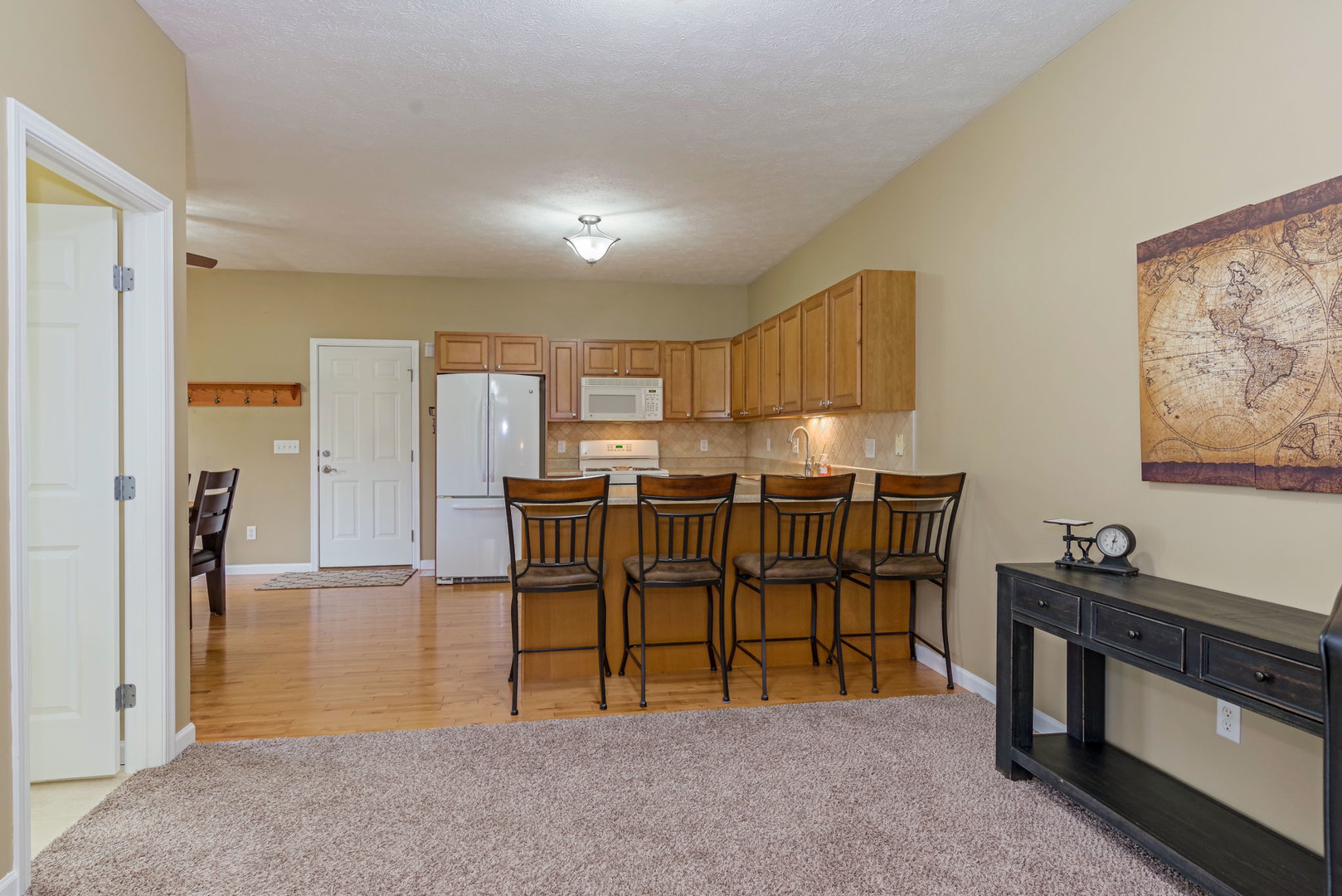 1611 Belclare Road Normal, IL 61761 - Photo 8 of 34 a view of kitchen with furniture and refrigerator