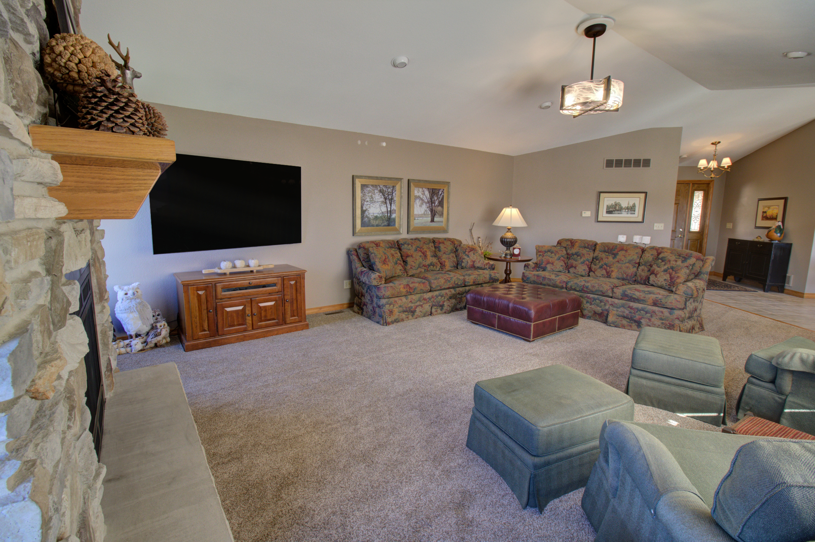 16360 Spring Valley Road Morrison, IL 61270 - Photo 14 of 60 a living room with furniture and a flat screen tv