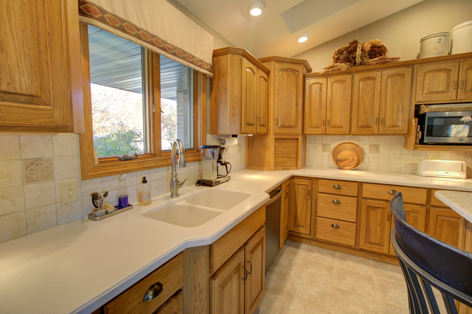 16360 Spring Valley Road Morrison, IL 61270 - Photo 24 of 60 a spacious bathroom with a double vanity sink a mirror and a bathtub
